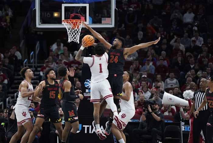 Donta Scott (24) defends Indiana Hoosiers guard Jalen Hood-Schifino (1) during the second half at United Center.